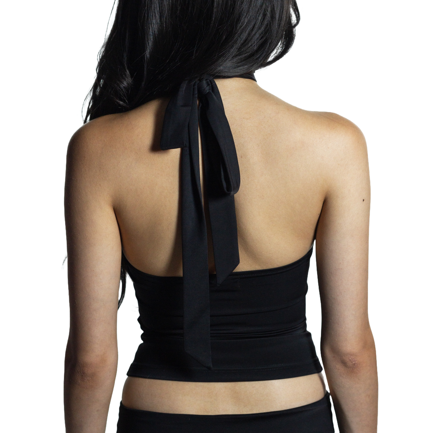 Back view of self-tieing jet black asymetrical top