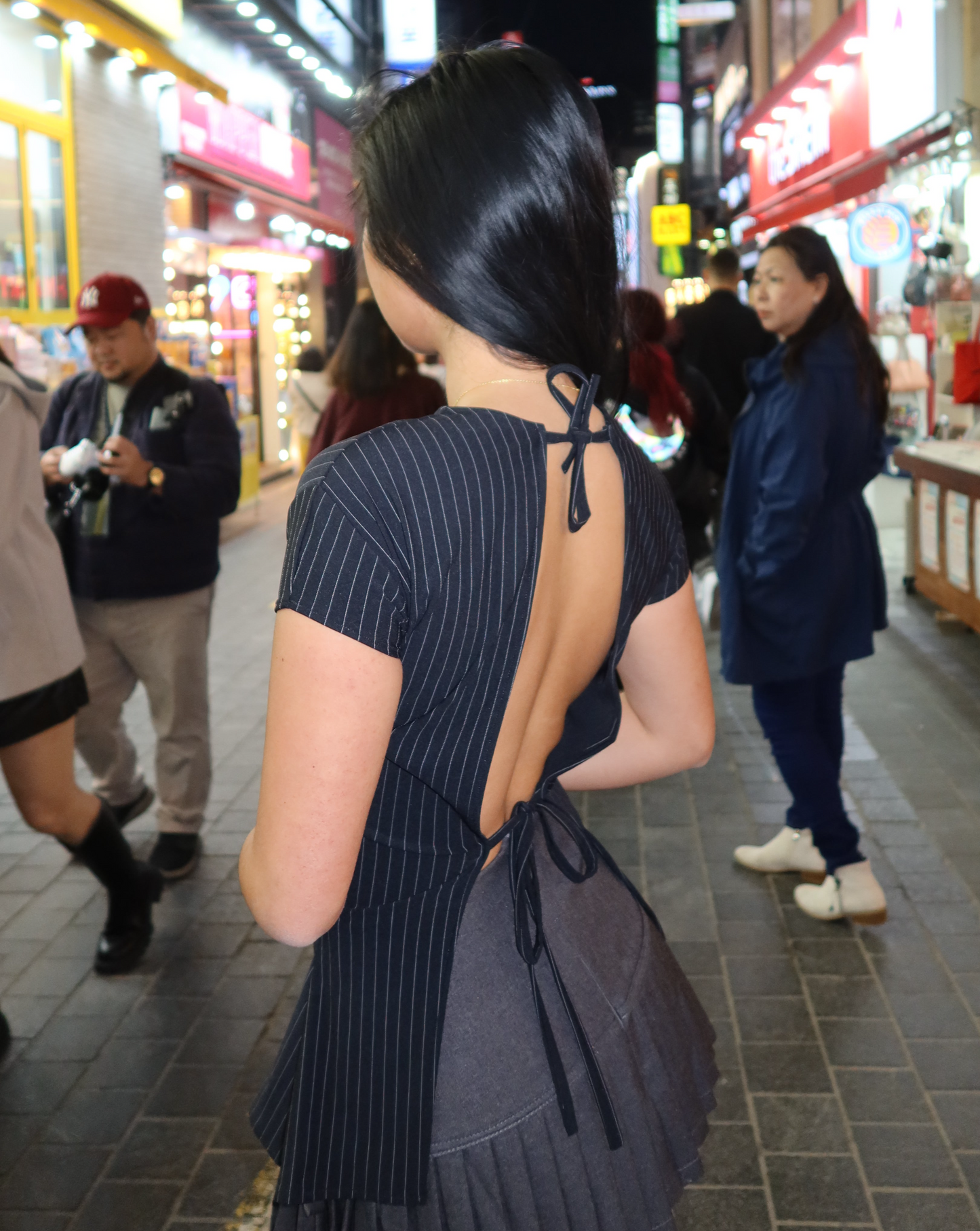 Back view of pinstripe self tie, open back, handmade top. 